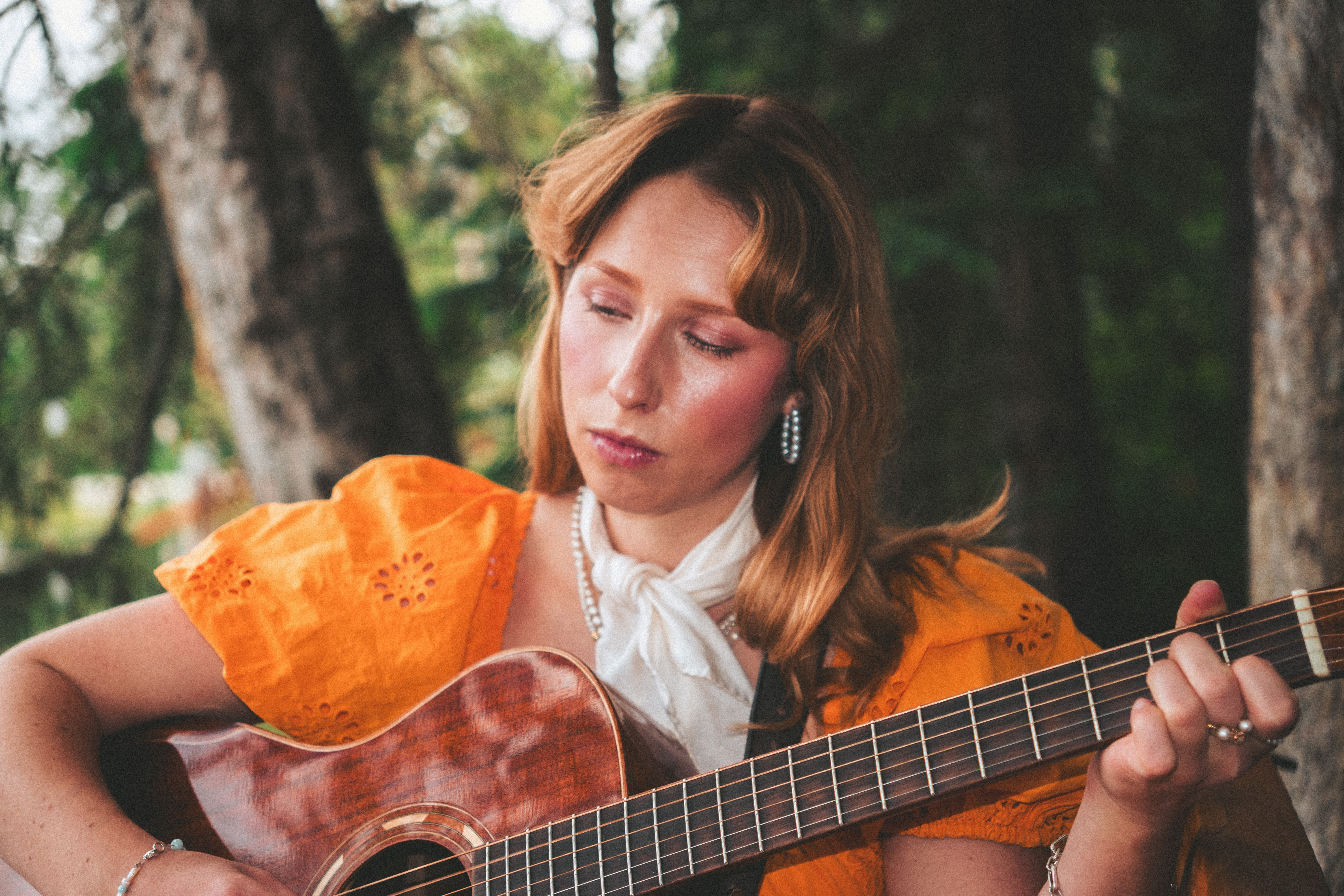 Live musician performing at a picnic